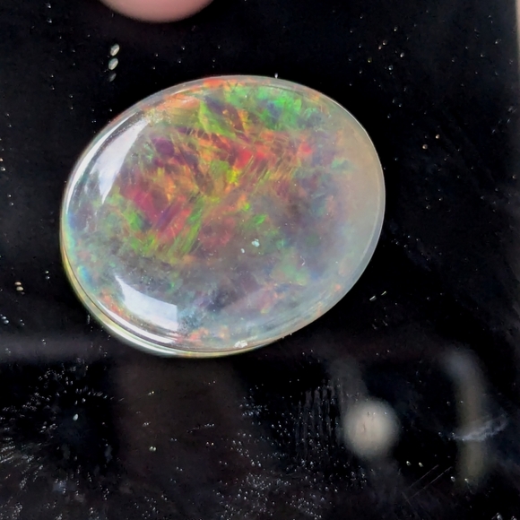 5.85ct Natural play of color black opal - Picture 2 of 16